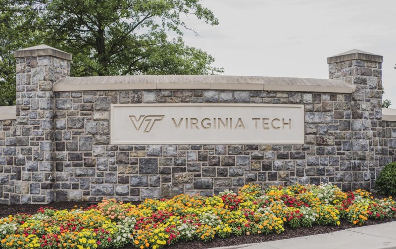 The university entrance sign on a wall of Hokie Stone.